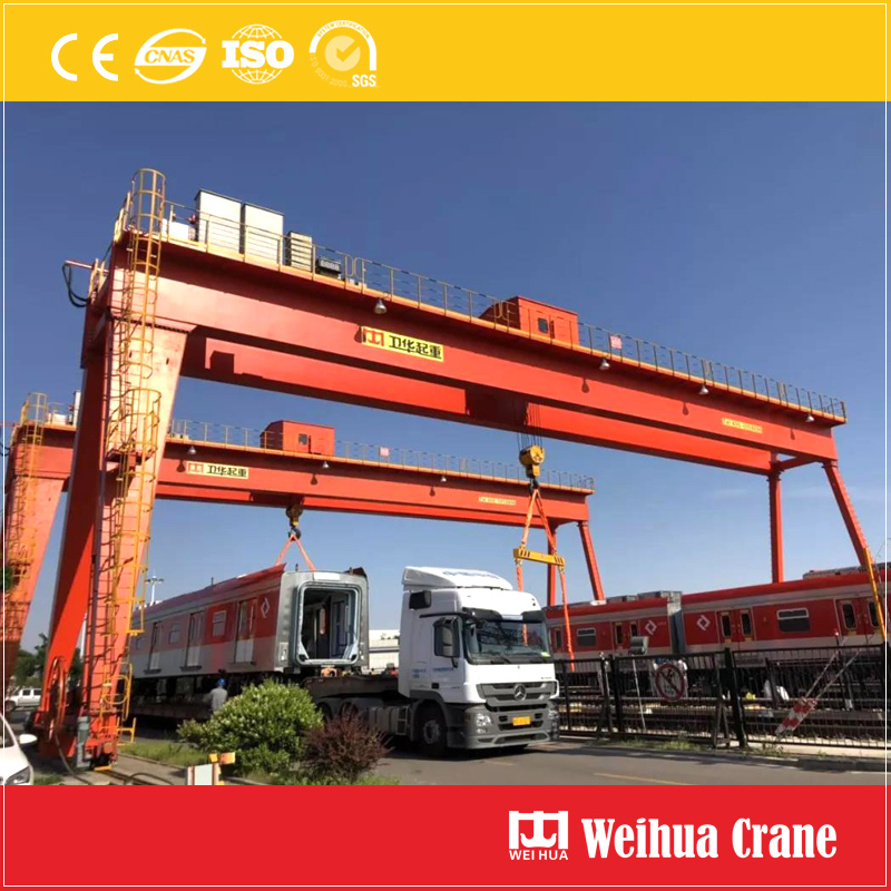 2-gantry-cranes-lifting-train